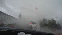This dashcam footage of a typhoon swallowing a car is terrifying