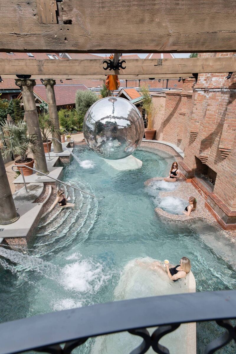 Overlooking the heated pool and disco ball at The Rabbit Hotel &amp; Retreat, Co Antrim