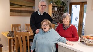 <p> Tony Murray, with his wife Susan and their 42-year-old daughter Aoife, who has an intellectual disability and is cared for full-time by her parents. Picture: Moya Nolan</p>