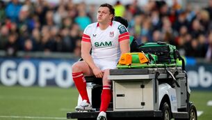 <p>Ulster's Angus Bell leaves the pitch injured. Pic: Grace Halton</p>