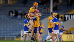 <p>STRONG FINISH: Clare's Robert Loftus and Joe Casey celebrate.</p>