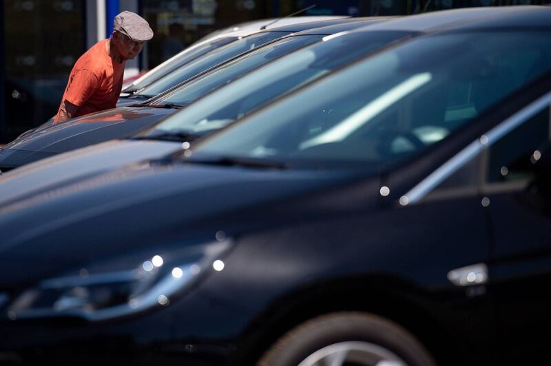 Real dealerships or sellers will usually take photos of a car in the same location and at the same time of day, with the same backdrop as well.