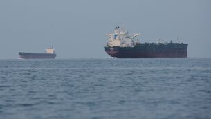 <p>Tankers anchored in the Strait of Hormuz (Asghar Besharati/AP)</p>