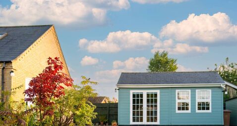 Shallow focus of summer flowers seen in a back garden.