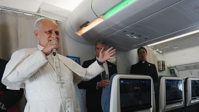 Pope Leo XIV speaks to journalists aboard the papal flight from Malabo to Rome on Thursday (Andrew Medichini/AP)