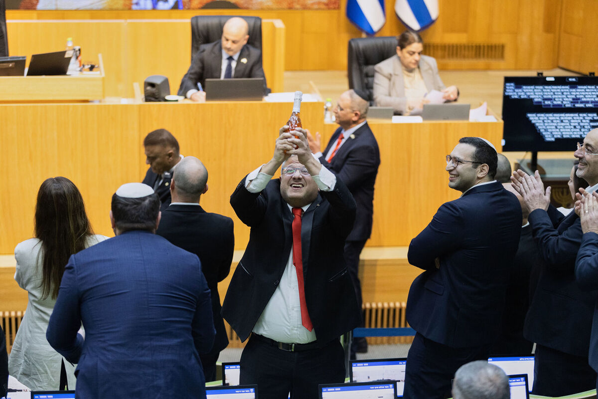 Israel's minister of national security Itamar Ben-Gvir, centre, and lawmakers celebrate after Israel's parliament passed a law approving the death penalty for Palestinians convicted of murdering Israelis. Picture: AP/Itay Cohen