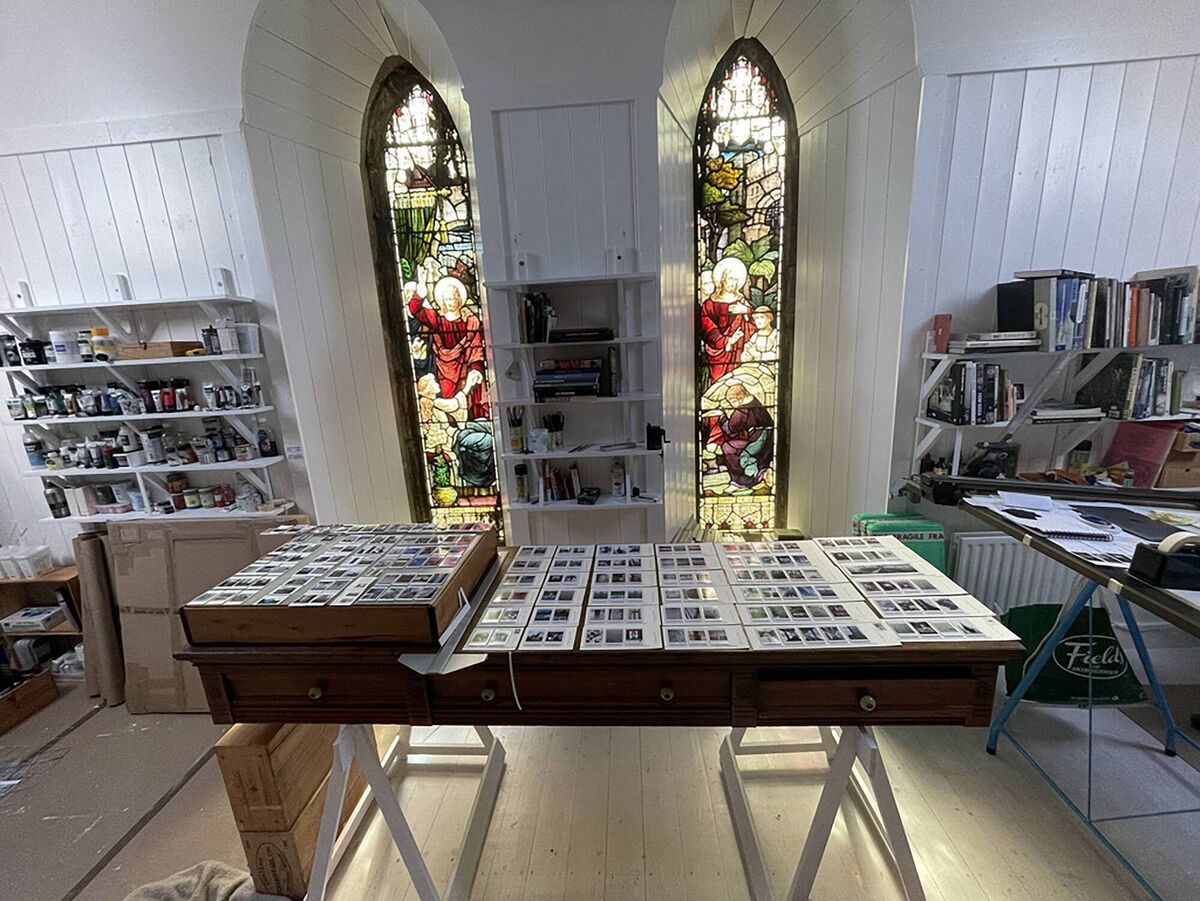 Stained-glass windows form an apt backdrop in artist Johanna Connor's studio.