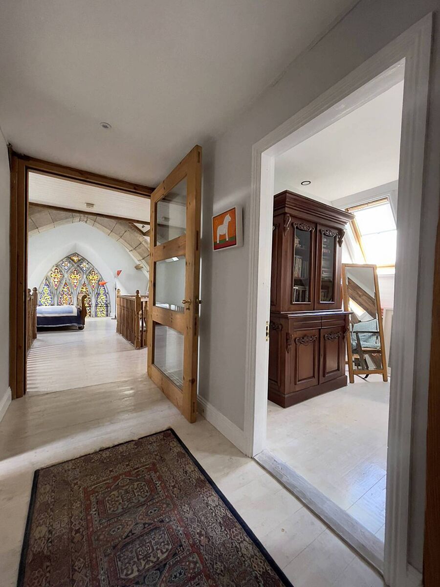 View of the hallway and two bedrooms in the Co Cork converted church.