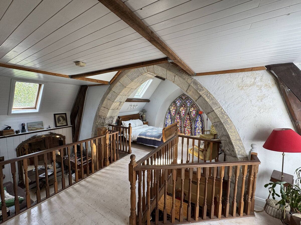 The mezzanine and altar end above the kitchen. 