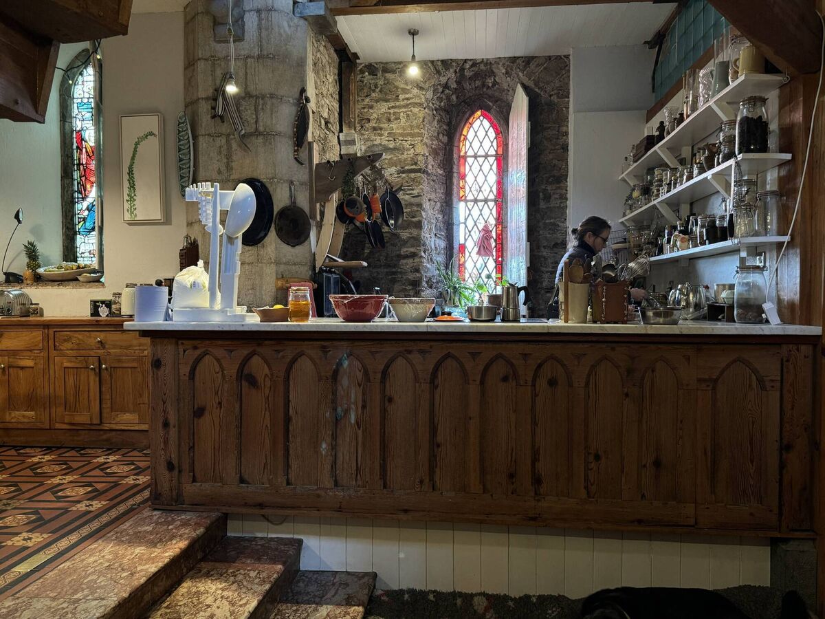 Artist Johanna Connor busy in the kitchen in the converted church.