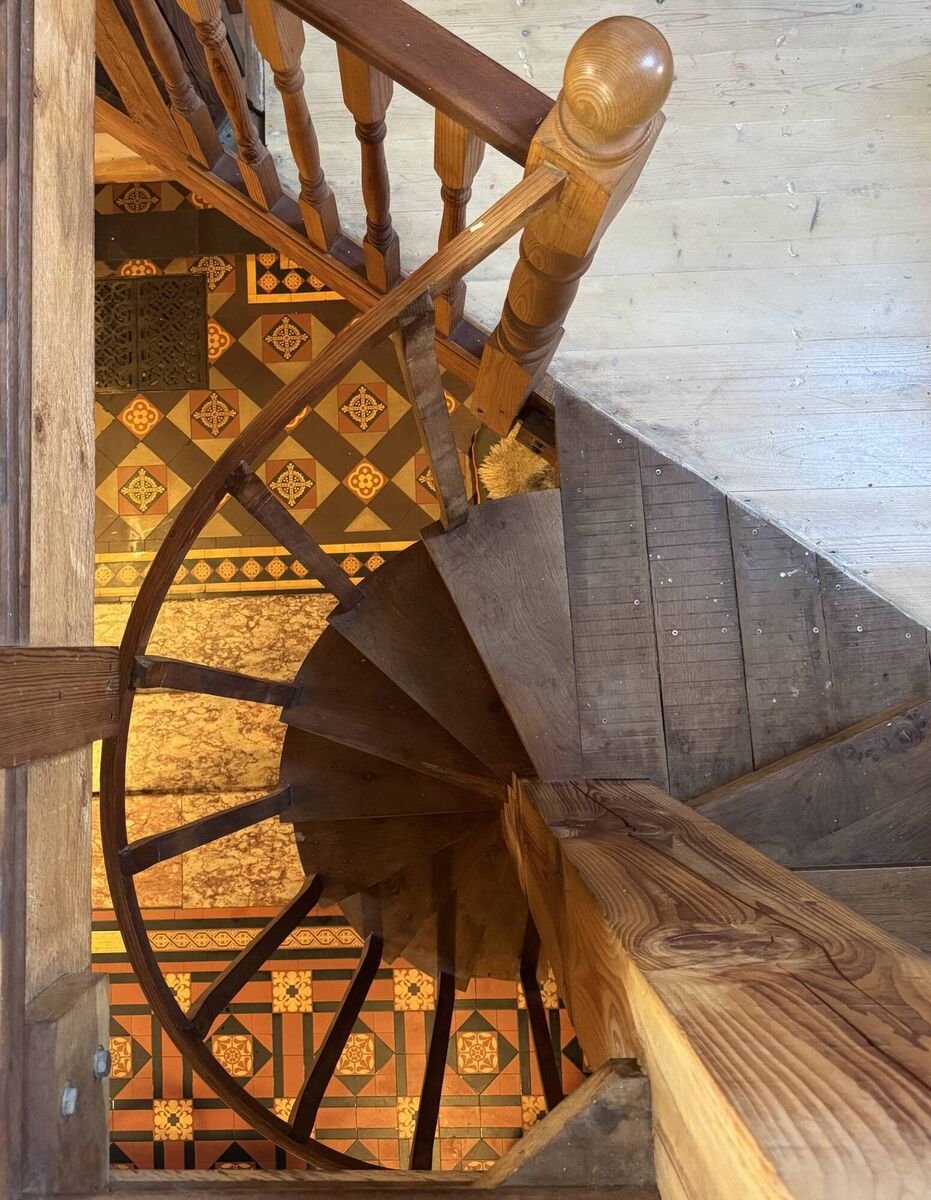 Tiles and timber on the spiral staircase.