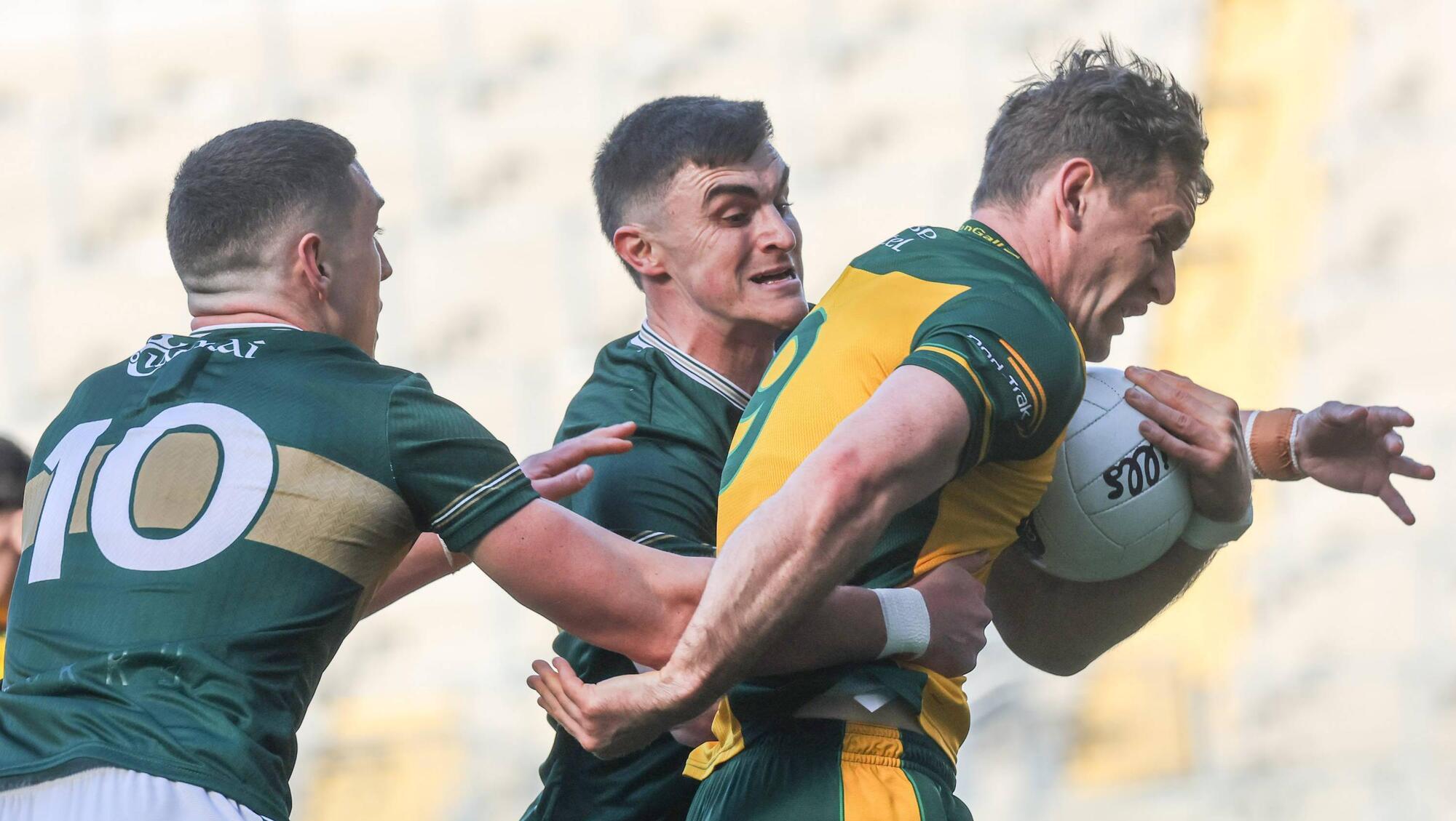 MIA: Kerry pair Sean O'Shea and Joe O'Connor pursue Donegal's Hugh McFadden in the Allianz Football League Division 1 final last month in Croke Park. Both Kingdom aces miss this weekend's Munster SFC bow in Ennis. Pic: Tom Maher