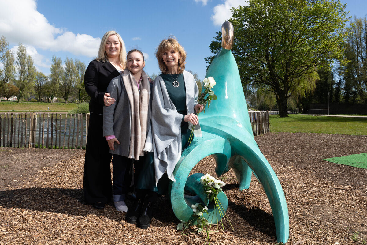 Adi Roche (left), founder of Chornobyl Children International with Chornobyl children Anna Gabriel (left) and Raisa Carolan (centre) at the unveiling of the ‘Chornobyl Mother’ sculpture in Marina Park, Cork to mark the 40th anniversary of the Chornobyl nuclear disaster. Photo. Darragh Kane