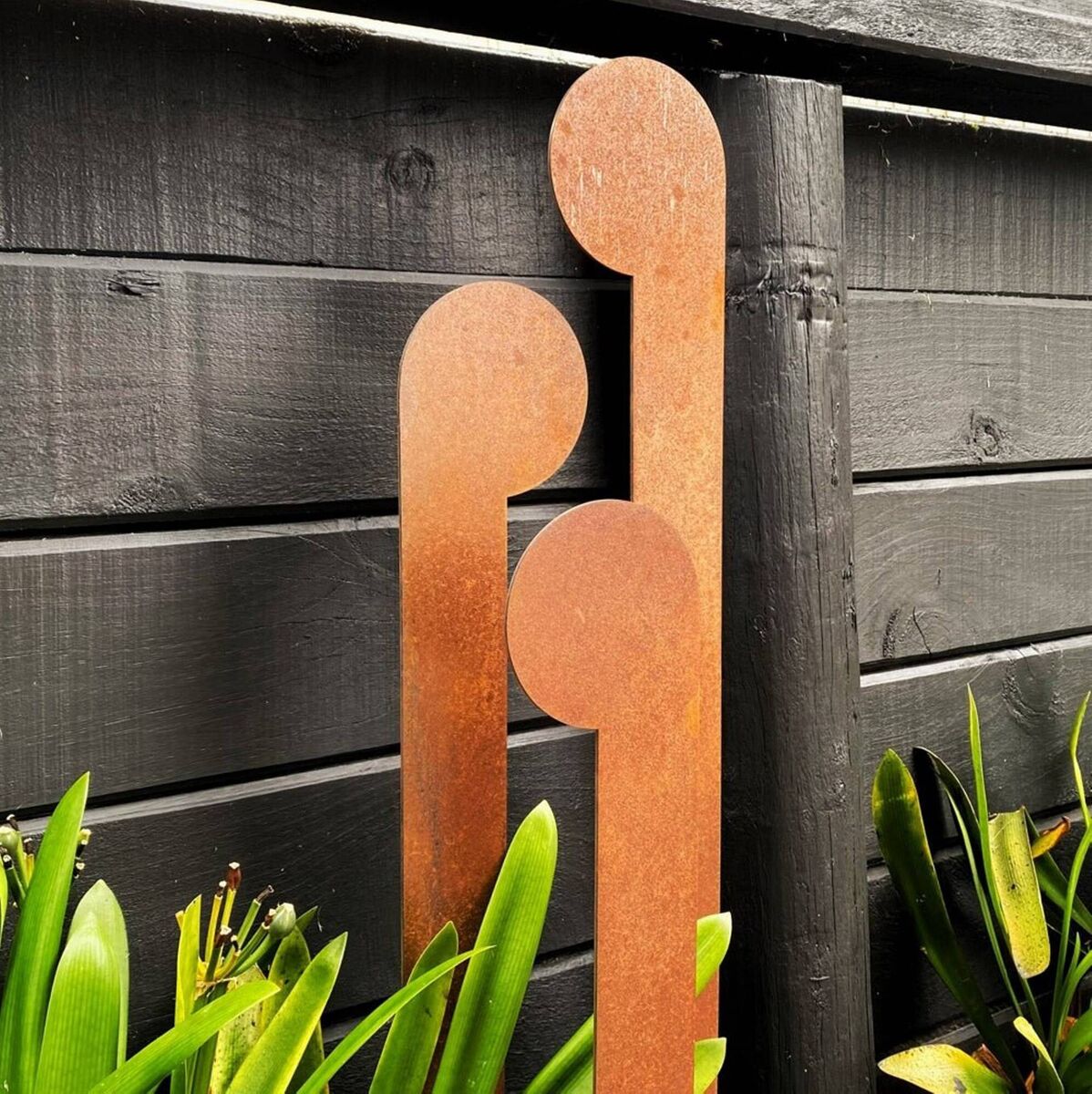 The weathering on these sculptural stakes by New Zealander Lisa Sarah sings with the greenery and a richly stained black fence. From 85cm to 1m high, they're €151 each, Lisasarah.com.