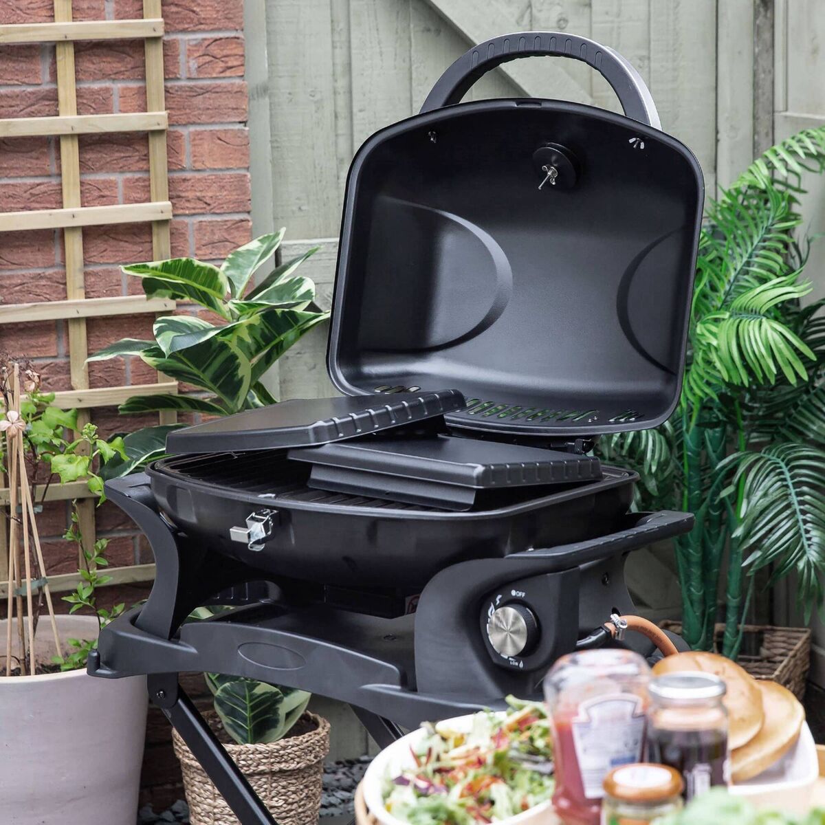 The George Foreman portable gas BBQ in power-coated steel is a sleek easy-to-use one-burner propane grill. €149, Currys.ie. 