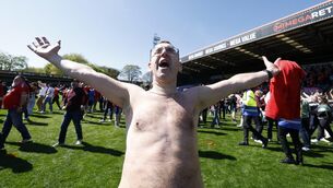 <p>NAKED PASSION: York City fans celebrate on the pitch at the final whistle after the Enterprise National League match at the Crown Oil Arena, Rochdale. Pic: Cody Froggatt/PA Wire</p>