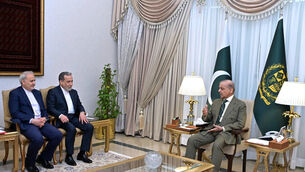 Iranian foreign minister Abbas Araghchi (second left) meets Pakistani Prime Minister Shehbaz Sharif in Islamabad (Pakistan Prime Minister Office via AP/PA)