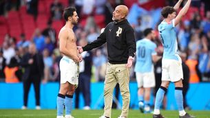 <p>BRAINS TRUST: Manchester City manager Pep Guardiola (right) speaks with player Bernardo Silva following victory in the Emirates FA Cup semi-final match at Wembley Stadium, London. Pic: Adam Davy/PA Wire.</p>