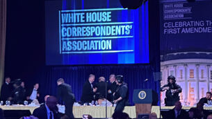 US Secret Service agents surround President Donald Trump (Alex Brandon/AP)