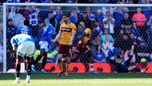 <p>FEELING BLUE: Motherwell's Stephen O'Donnell celebrates after his team mate Emmanuel Longelo (rear) scored their sides third goal during the William Hill Premiership match at Ibrox Stadium, Glasgow. Picture date: Sunday April 26, 2026. PA Photo. Photo credit should read: Andrew Milligan/PA Wire</p>