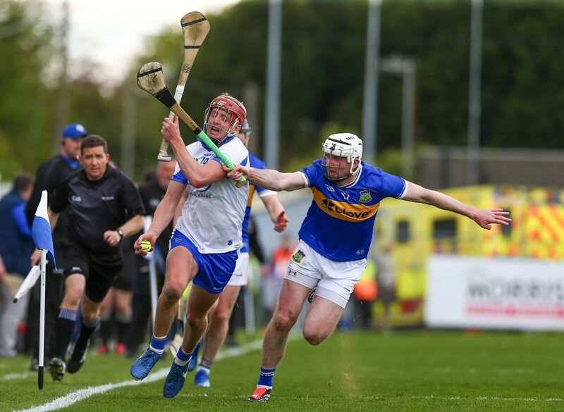 Waterford's Calum Lyons in action against Tipperary's Seamus Kennedy. Pic: ©INPHO