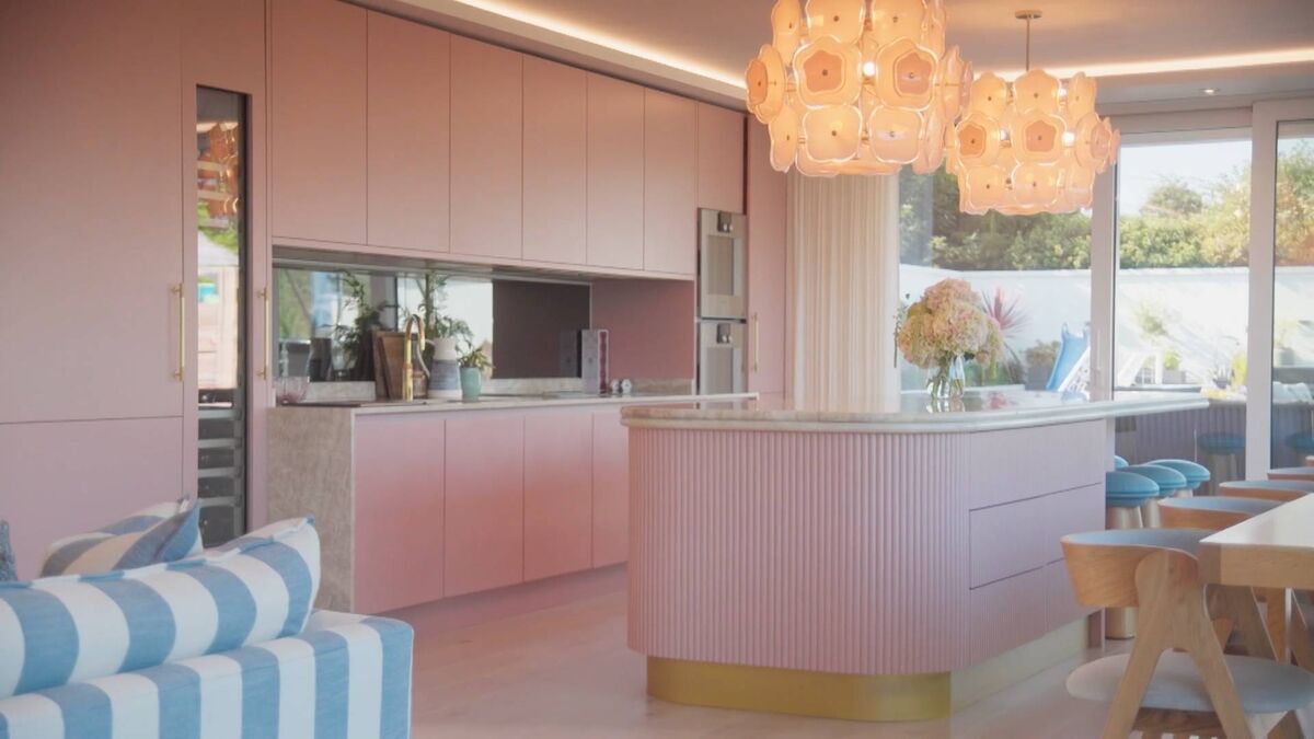 Vogue adores her pink kitchen.