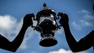 <p>Kildare captain Kevin Feely and Limerick captain Cillian Fahy hold the Tailteann Cup trophy Photo by Ramsey Cardy/Sportsfile </p>