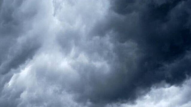 <p>A Caution Sign in Front of dramatic Storm Clouds Warning of Approaching Storms.</p>