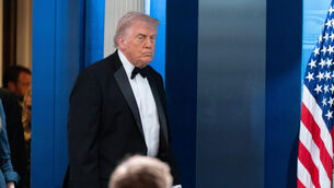 President Donald Trump arrives to speak to the media in the James Brady Press Briefing Room at the White House after the incident at the annual White House Correspondents’ Association dinner in Washington (Jose Luis Magana/AP)