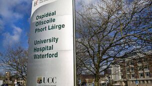 <p>The woman was rushed to University Hospital Waterford after being found with serious injuries at a property in Grange Heights.</p>