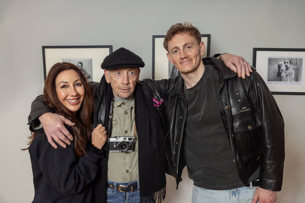  John Minihan with his children, Siobhan and Bosco, at the National Gallery of Ireland. Picture: Abe Neihum