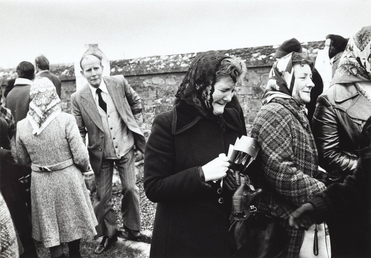 After the Burial of Mrs Katy Tyrell, in Athy in 1977. Picture: John Minihan/Courtesy of UCC After the Burial of Mrs Katy Tyrell, in Athy in 1977. Picture: John Minihan/Courtesy of UCC