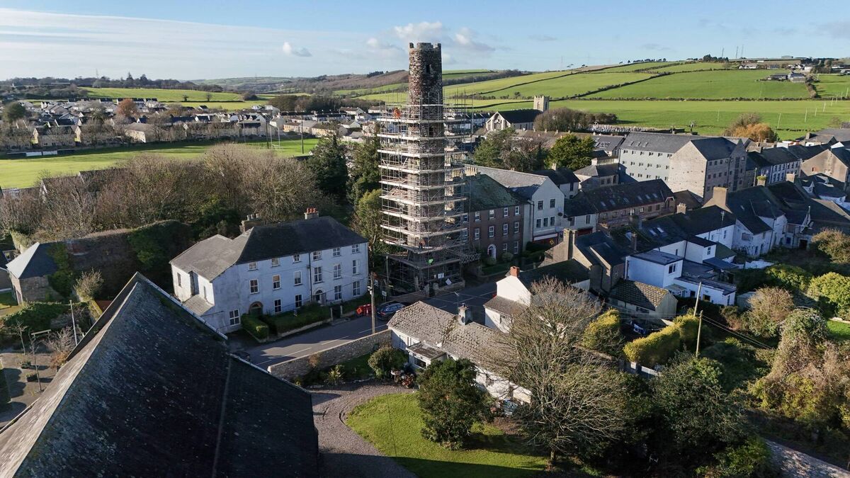 File picture November 2025: Workers remove scaffolding from the 11th-century round tower in Cloyne, County Cork, after completing moss cleaning and repointing. Picture: Dan Linehan