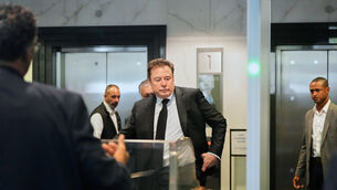 Elon Musk arrives at the court in California (Godofredo A. Vasquez/AP)