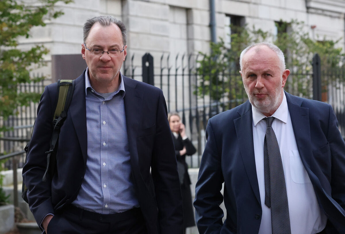 Irish Examiner Editor John O'Mahony and Special Correspondent Mick Clifford leaving the Four Courts on Tuesday where they are defending the defamation case brought by former IPI executive director Orla Purcell. Picture: Collins Courts