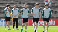 Mayo players inspect the pitch 26/4/2026