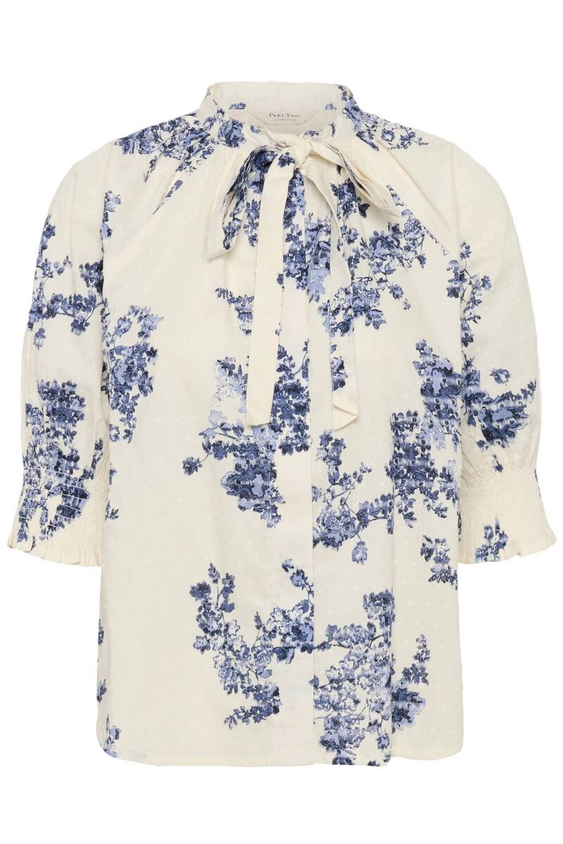 Blue Shadow Flower Print Shirt, €80, Nina'a Boutique.
