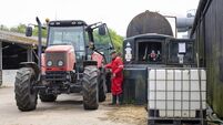 Refuelling The Agricultural Tractor on His Farm