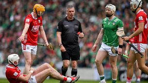 <p>Tim O'Mahony of Cork on the ground as referee James Owens approaches before he issues Cian Lynch of Limerick a red card. Pic: Ray McManus/Sportsfile</p> <p>Tim O'Mahony of Cork on the ground as referee James Owens approaches before he issues Cian Lynch of Limerick a red card. Pic: Ray McManus/Sportsfile</p>