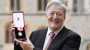 <p>Stephen Fry said he broke his right leg 'in a couple of places', as well as 'my hip and my pelvis in four places and a bunch of ribs'. File picture: Andrew Matthews/PA</p>