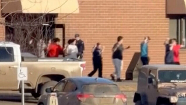 <p>Students exiting the Tumbler Ridge school after deadly shootings in British Columbia, Canada, in February. File picture: Jordon Kosik/AP</p>