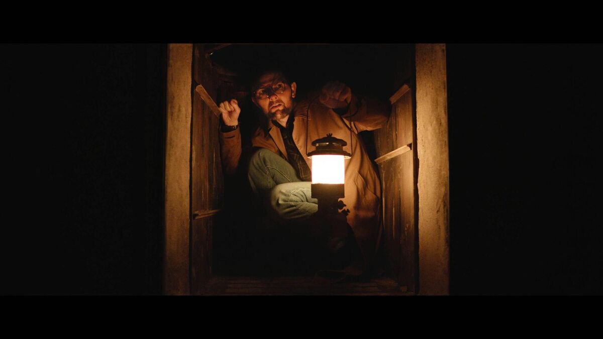 Adam Scott as Ohm Bauman in 'Hokum'