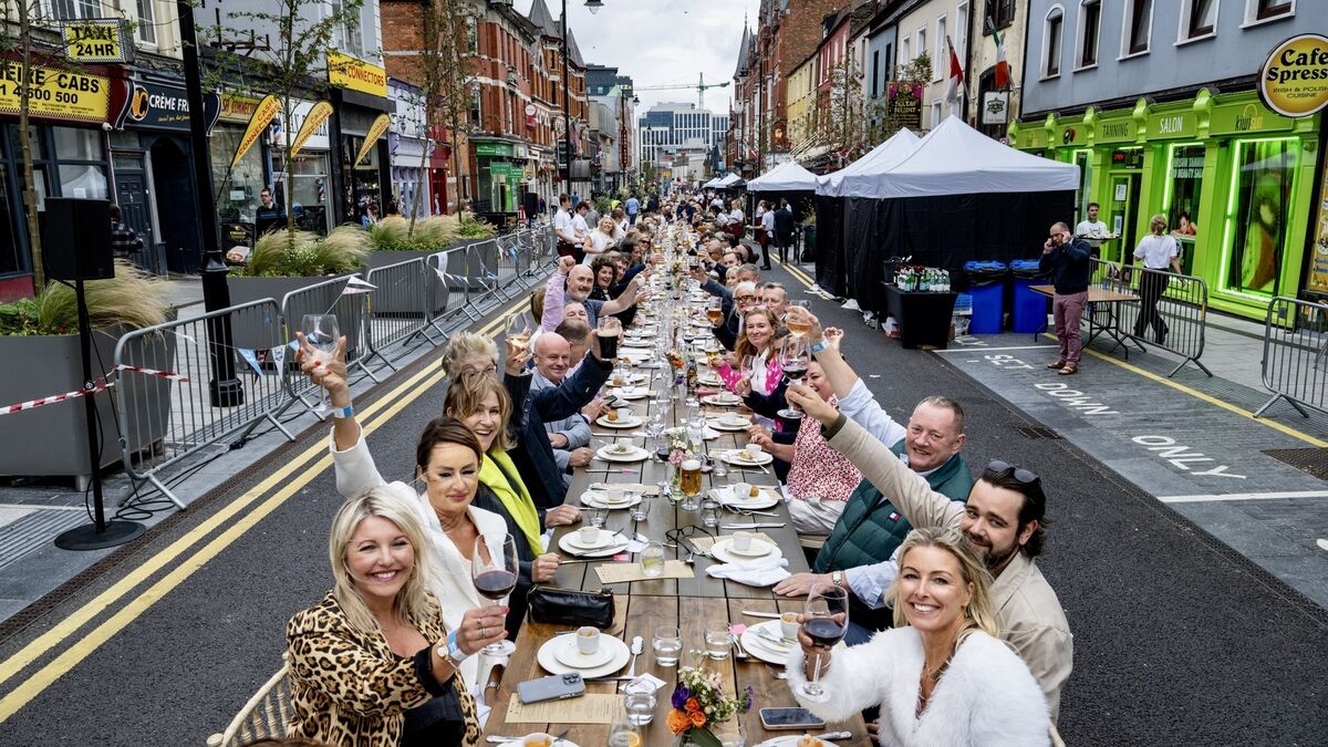 No more hiding from summer rain as Cork on a Fork's shared table has a cover for the first time