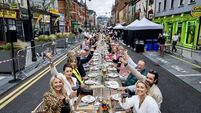 No more hiding from summer rain as Cork on a Fork's shared table has a cover for the first time