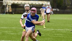 <p> Callum Coffey blasts in a late goal for Gaelcholáiste Mhuire against Spioraid Naomh earlier this year. Picture: Larry Cummins</p>