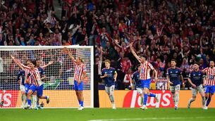 <p>Atletico Madrid appeal for a penalty after a shot from Marcos Llorente hits the hand of Arsenal's Ben White. Pic: Adam Davy/PA Wire.</p>