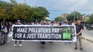 <p>Sinead Loughran (left) at the march in Santa Marta, Colombia, for a fossil-free future earlier this month.</p>