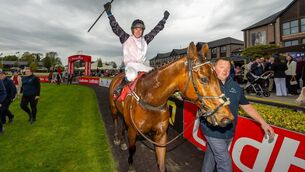 <p>OUT ON A HIGH: Darragh O’Keeffe celebrates winning The Ladbrokes Champion Stayers Hurdle (Grade 1) on Bob Olinger. Pic: INPHO/Morgan Treacy</p>