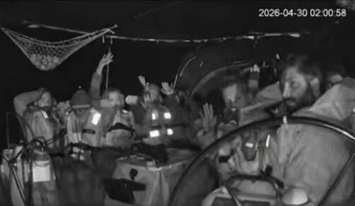 A screengrab from a camera on board one of the vessels in the flotilla showing the interception by Israeli forces in international waters. Picture: eire_globalsumud