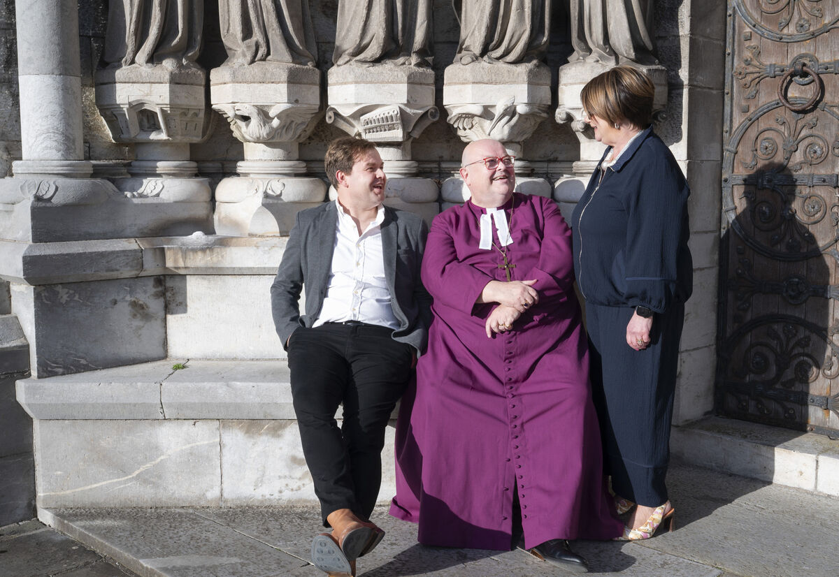 Bishop Paul Colton with Adam, one of his two sons, and his wife Susan after the farewell service at St Fin Barre’s Cathedral in Cork. Picture: Gerard McCarthy Bishop Paul Colton with Adam, one of his two sons, and his wife Susan after the farewell service at St Fin Barre’s Cathedral in Cork. Picture: Gerard McCarthy